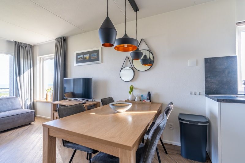 Stylish dining area in Apartment Juliana 118 Zeezicht, De Koog, Texel.