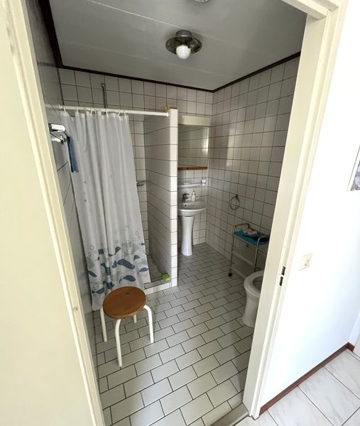 Attractive bedroom with double bed in Bungalow 't Luwe Land 5B in De Koog Texel.