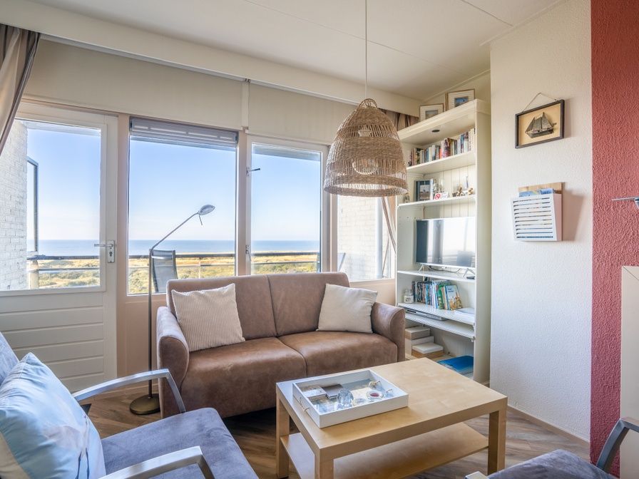 Gemuetliches Wohnzimmer im Appartement Juliana 158 Zeezicht, De Koog, Texel mit schoenem Meerblick.