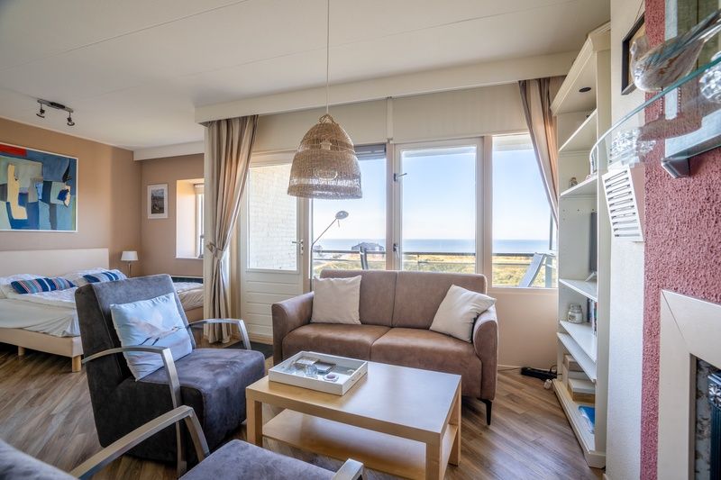 Geraeumiges Wohnzimmer mit Meerblick im Apartment Juliana 158 Zeezicht, Ferienhaus De Koog, Texel.