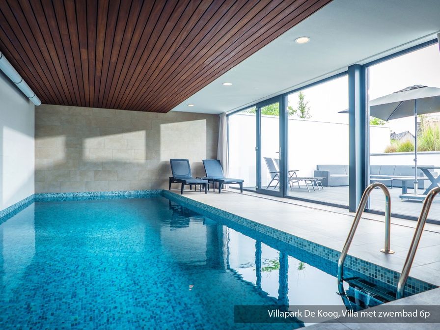 Luxury family villa with pool in De Koog, Texel. Modern architecture surrounded by lush nature on the Wadden Islands.
