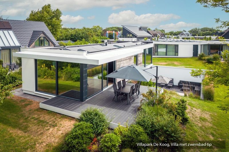 Terrace of the luxury family villa with pool in De Koog, Texel. Enjoy the view of the Wadden Islands.