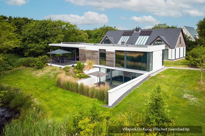 Luxury family villa with pool in De Koog, Texel. Beautiful garden and modern architecture on the Wadden Islands.