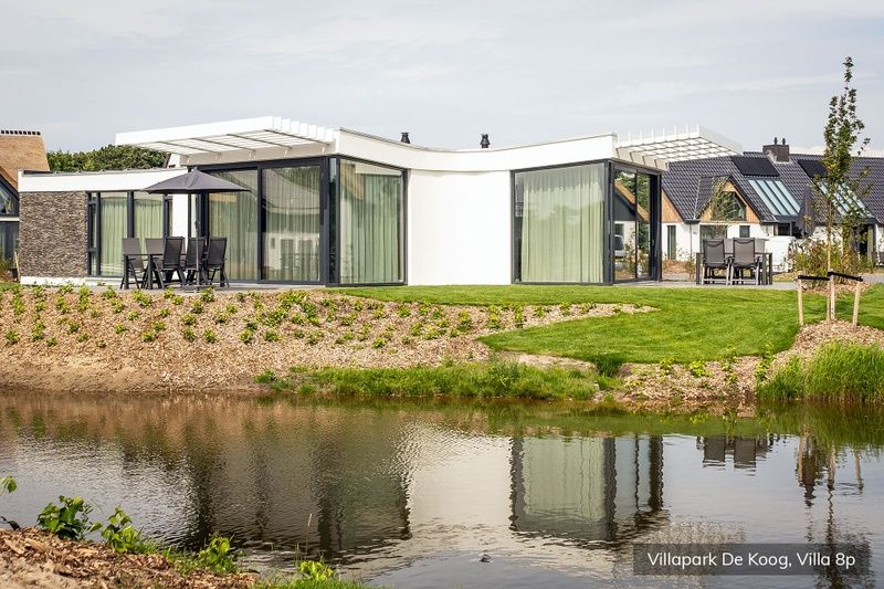 Vacation home Luxury family villa 8p in De Koog, Texel with beautiful view of pond.