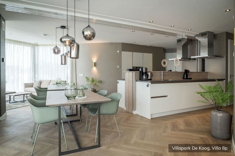 Spacious kitchen and dining area in Luxury family villa 8p, De Koog, Texel for a comfortable vacation.