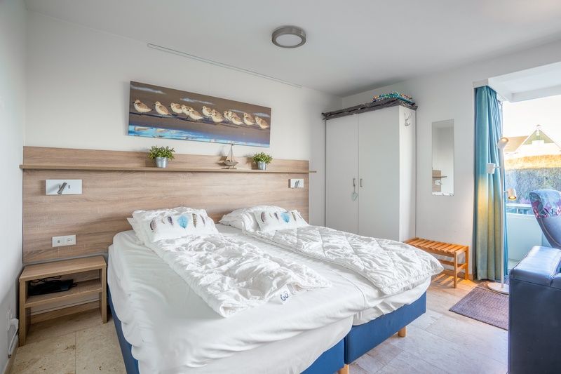 Comfortable bedroom in Apartment Juliana 068 Island and Sea View, De Koog, Texel with double bed.