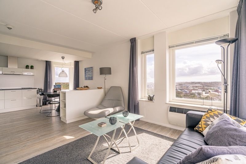 Offene Kueche und Essbereich im Apartment Juliana 132 Eilandzicht, De Koog, Texel mit moderner Einrichtung.