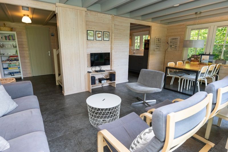 Cozy living room in Het Boshuis, Holiday Park Het Oude Dijkje, De Koog, Texel with modern furnishings.