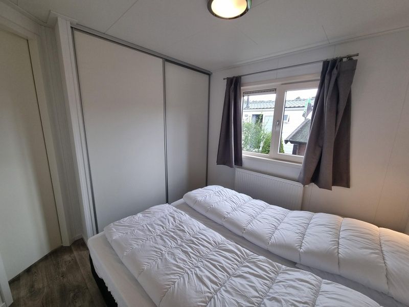 Spacious bedroom with closet space in Chaletpark Bregkoog - Chalet 240 De Texelse Berg, De Koog, Texel.