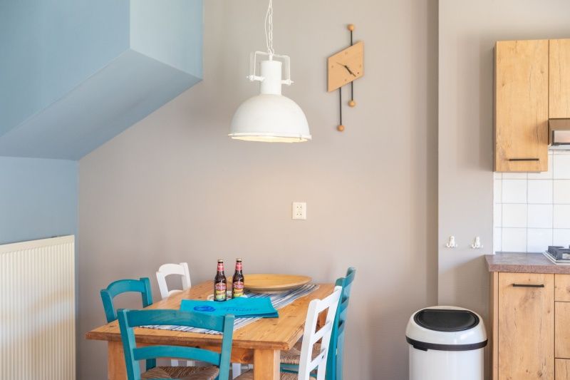 Dining area in Landgoed Springtij - Koetshuis 2, vacation home in De Koog, Texel, with an inviting atmosphere for cozy meals.