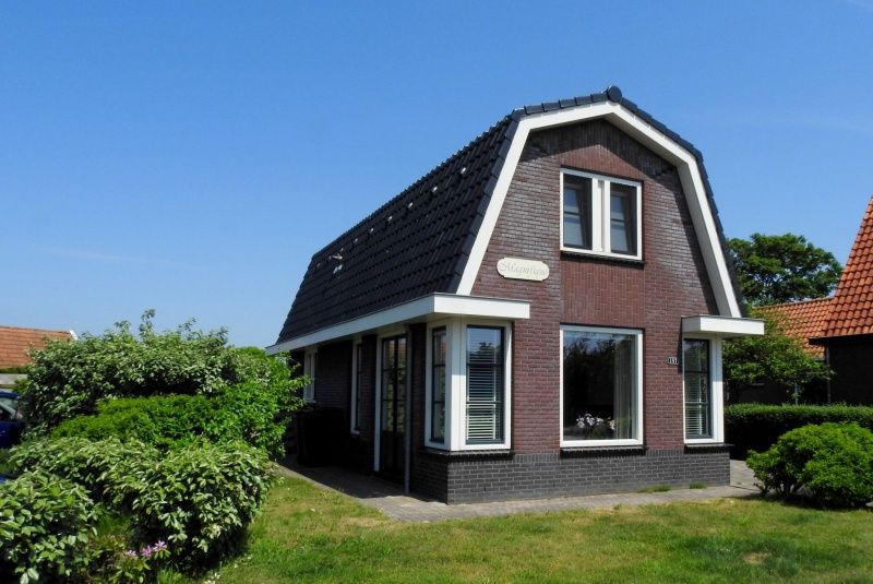 Ferienhaus Villa Magnifique in Den Burg, Texel: stilvoller Aussenbereich mit Garten und sonniger Lage.