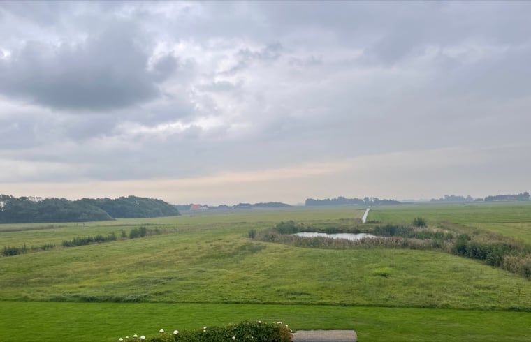 Views of the vast fields surrounding Cottage in Den Burg, Texel, for serene moments.