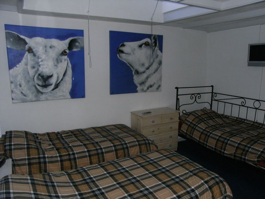 Guest house 0104202 - Holiday property Texel - B&B 't Waalderhofje - Driepersoons kamer met gedeelde