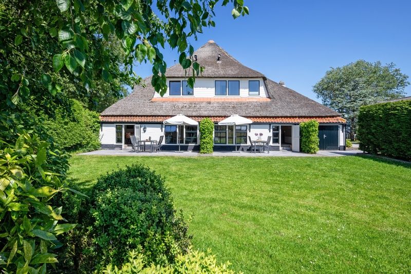 Groene omgeving van Appartement Gouden Reaal 25 in Den Hoorn Texel, vakantiehuis met ruime tuin op de Waddeneilanden.