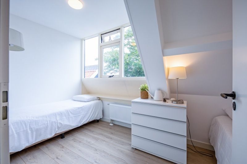 Bright guest room in Hotel Loodsmans Welvaren - Apartment, Den Hoorn, Texel.