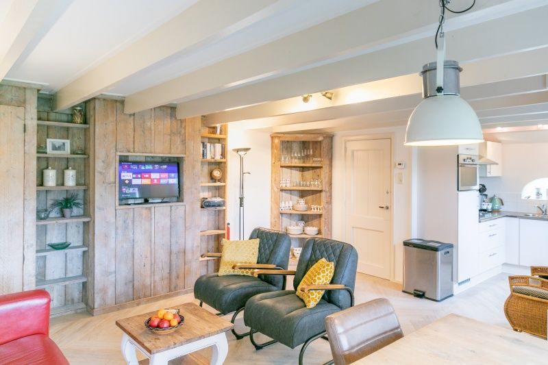 Spacious living room in Apartment Hof, Den Hoorn, Texel, perfect for relaxation.