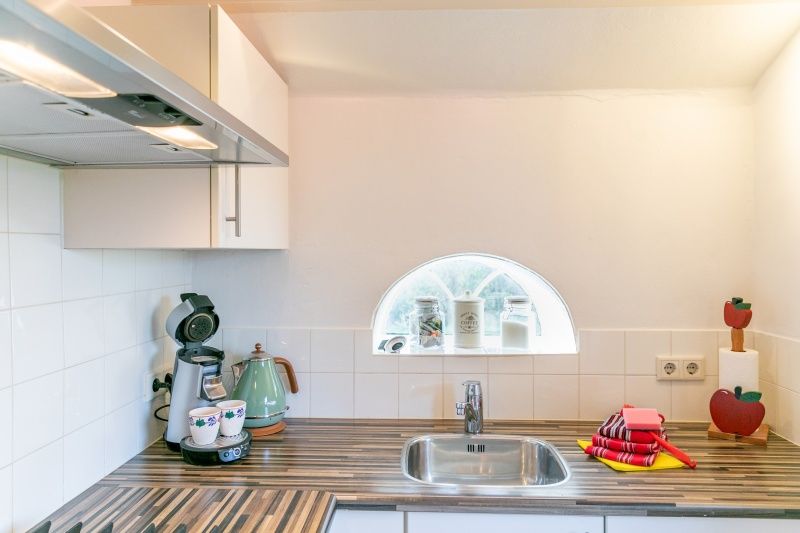 Kitchen with modern amenities in Apartment Hof, Den Hoorn, Texel, vacation home on the Wadden Islands.