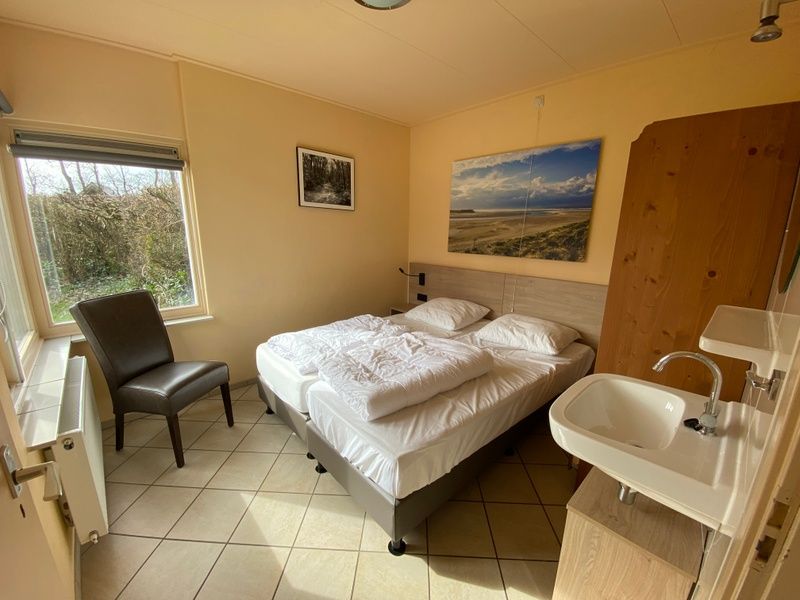 Comfortable bedroom in Tuinwal vacation home, Oosterend Texel.