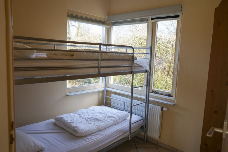 Bright children's room with view in Garden Wall vacation home, Texel.