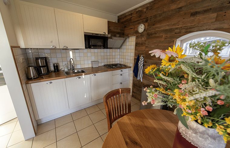 Modern kitchen in Holiday home in Oosterend, Texel. Fully equipped vacation home on the Wadden Islands.