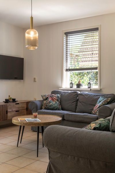 Comfortable living room in Type I - No. 55 Marel, vacation home in Oosterend Texel, with modern furnishings for a relaxing stay on the Wadden Islands.