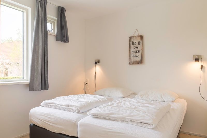 Attractive bedroom in Type I - No. 55 Marel, vacation home Oosterend Texel, with comfortable beds for a good night's sleep on the Wadden Islands.