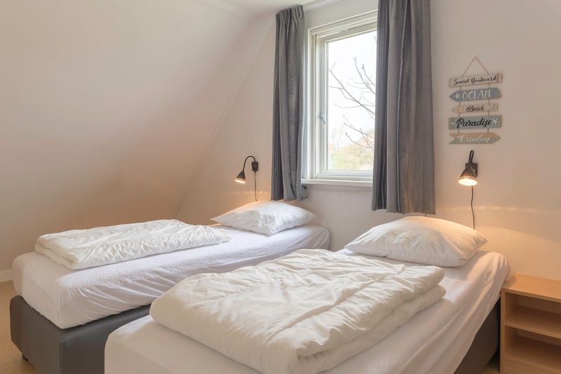 Bright bedroom in Type I - No. 55 Marel, vacation home Oosterend Texel, with views of the surroundings, perfect for rest on the Wadden Islands.