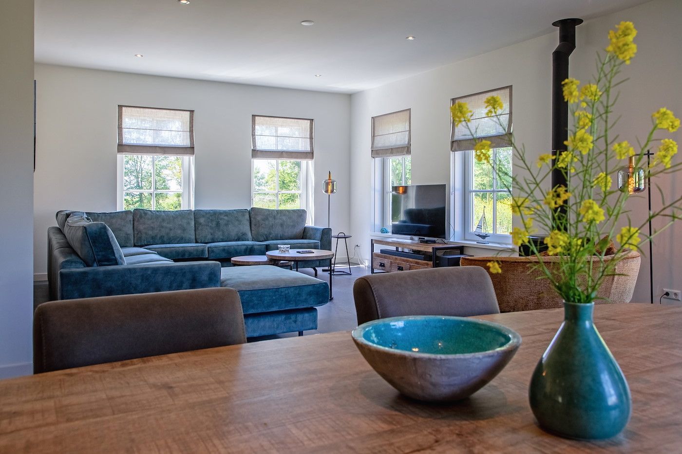 Eethoek met uitzicht op de tuin in vakantiehuis 46 - Nieuw Zeeland, Oosterend, Texel.