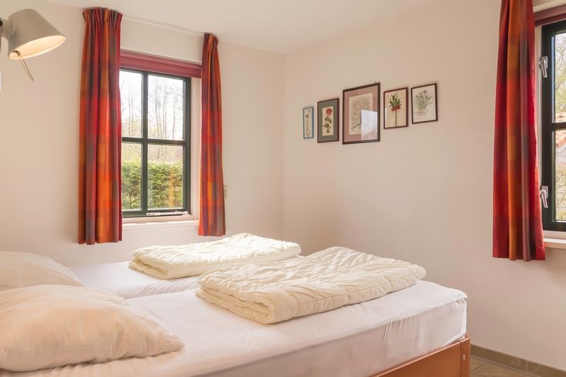 Bedroom with two beds in Type III - No. 21B Pheasant, Oosterend, Texel for a good night's sleep.