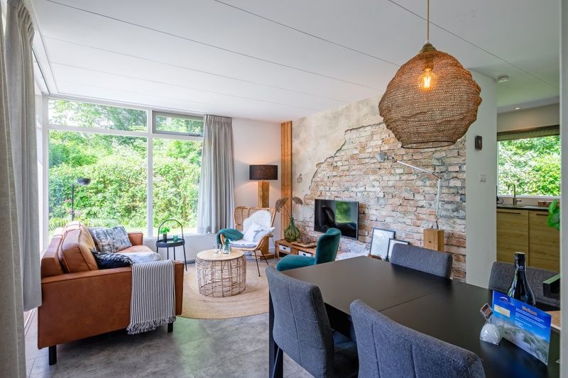 Bright and spacious indoor space with modern furnishings in Bungalowpark De Toes - Zeewier, Oosterend, Texel.