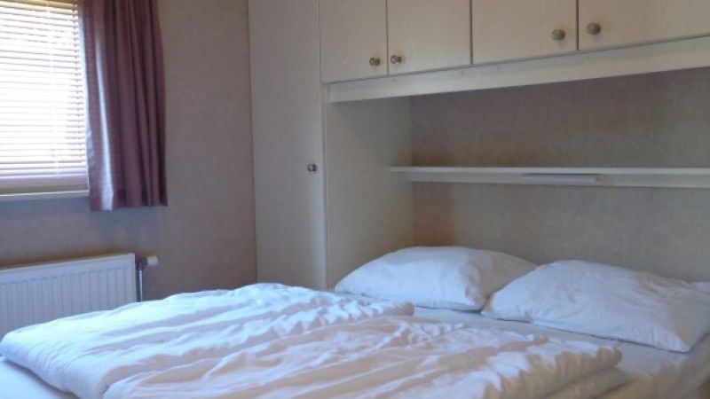 Komfortables Schlafzimmer im Vakantiepark de Bremakker Bosveld 104, Ferienhaus De Dennen, Texel.