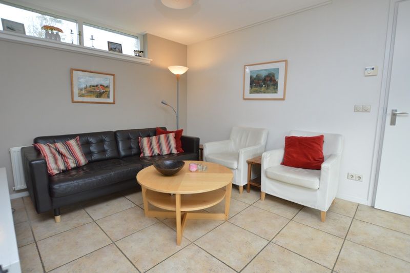 Gemuetliches Wohnzimmer im Bungalow Uterste Coogh 78, De Dennen, Texel, Waddeninseln.