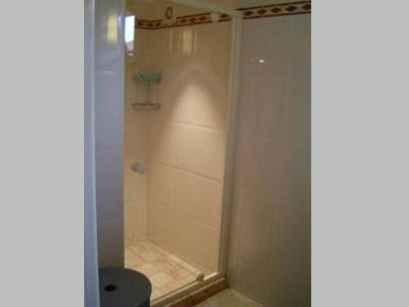 Stylish bathroom in Holiday home Gortersmient 356, De Dennen, Texel. Enjoy luxury amenities on the Wadden Islands.