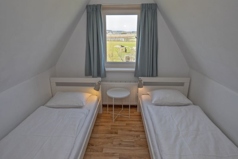 Doppelzimmer mit Aussicht in Huisje 6, Ferienhaus auf Texel, De Dennen.