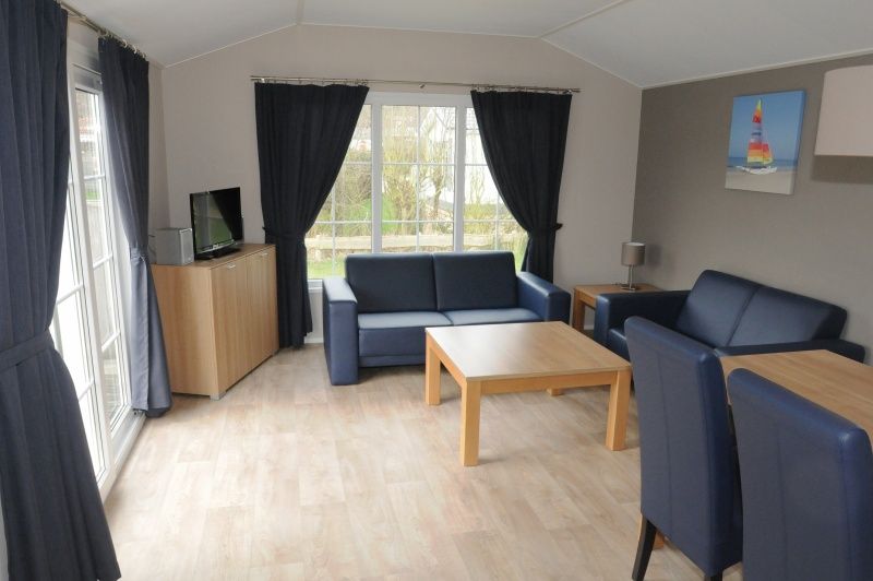 Gemuetliches Wohnzimmer des Villetta Ferienhauses fuer 4 Personen in De Dennen, Texel, Watteninseln.