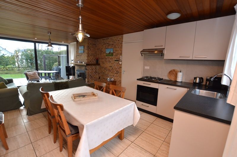 Cozy kitchen in Holiday home the Pearl 258, De Dennen, Texel with modern amenities.