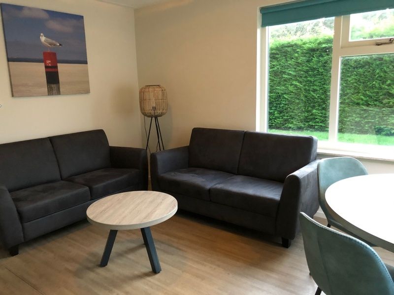 Gemuetliches Wohnzimmer im Ferienhaus Typ 1, De Dennen, Texel, Waddeninseln.