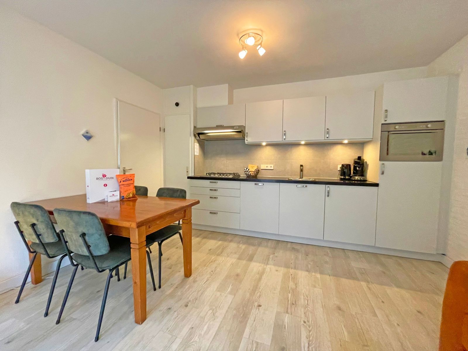 Restful bedroom in Apartment Bos en Duin 08, De Dennen, Texel, overlooking nature.