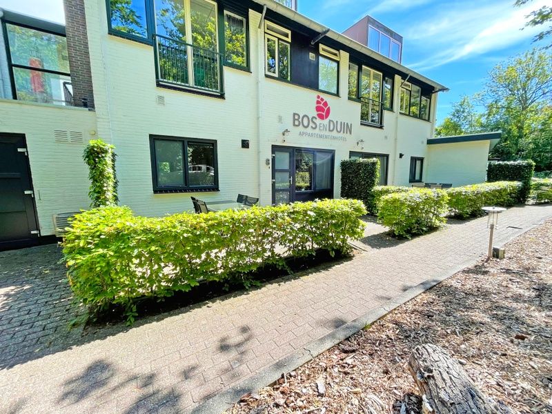 Apartment Bos en Duin 08, De Dennen, Texel, with green surroundings and modern amenities.