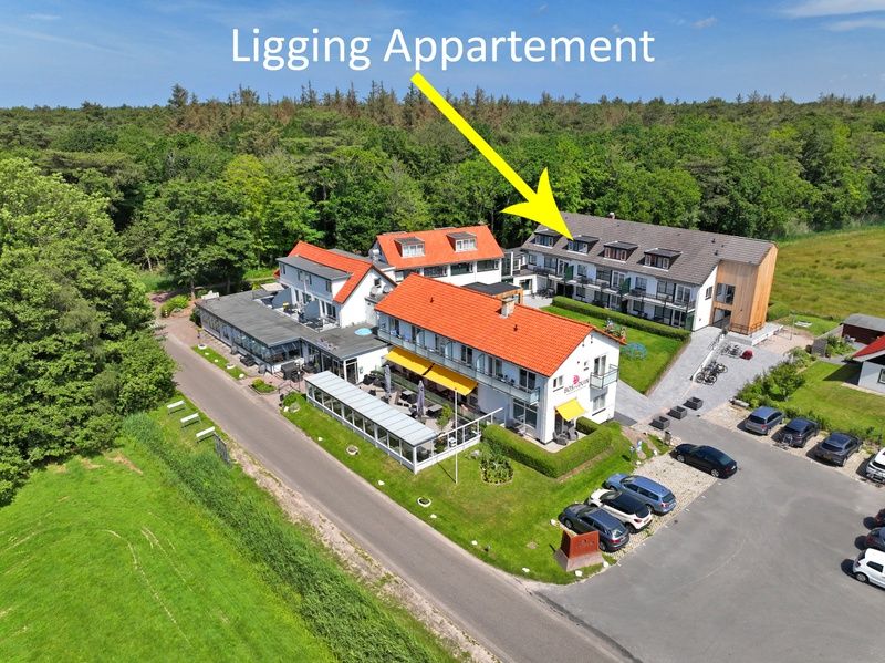 Aerial photo of Apartment Bos en Duin 33, De Dennen, Texel shows beautiful location amidst nature.