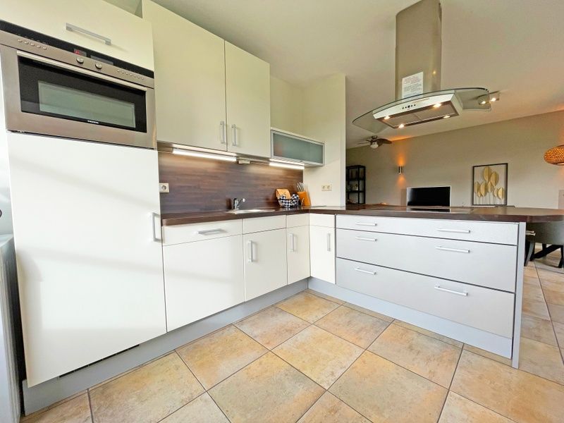 Luxe slaapkamer in Appartement Bos en Duin 37, De Dennen, Texel met comfortabele bedden en rustige ambiance.