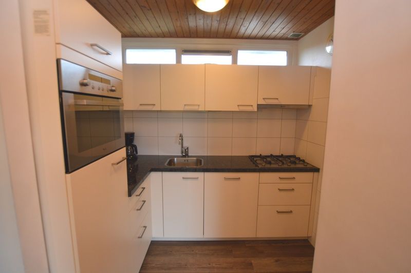 Moderne keuken in Vakantiehuis de Parel 234, De Dennen, Texel met alle gemakken.