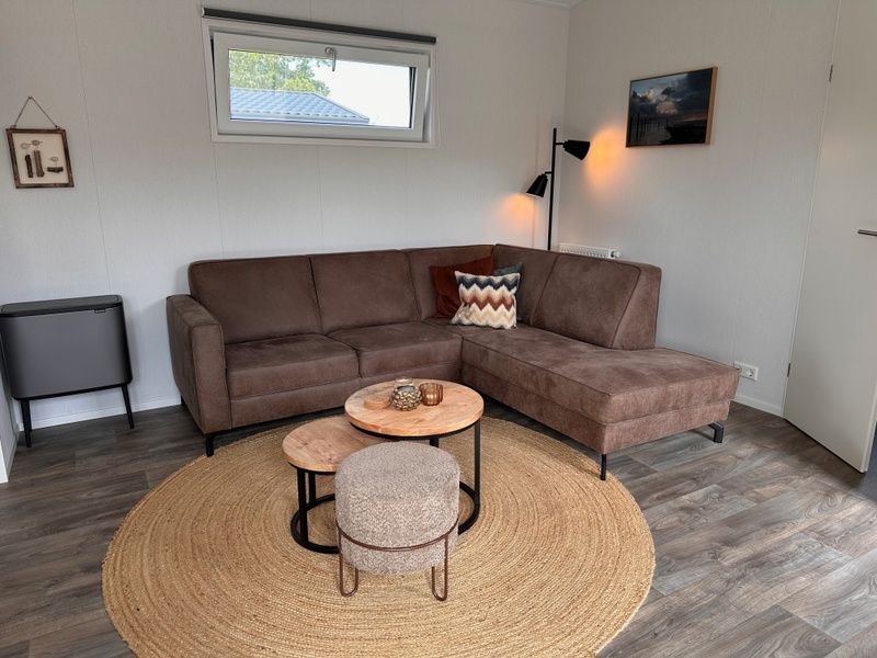 Comfortable sitting area in Chalet Wulk, Vakantiepark de Bremakker, Texel, perfect for relaxing in De Dennen.