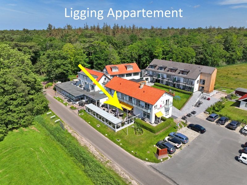 Aerial view of Apartment Bos en Duin 02, De Dennen, Texel, surrounded by nature and close to amenities.