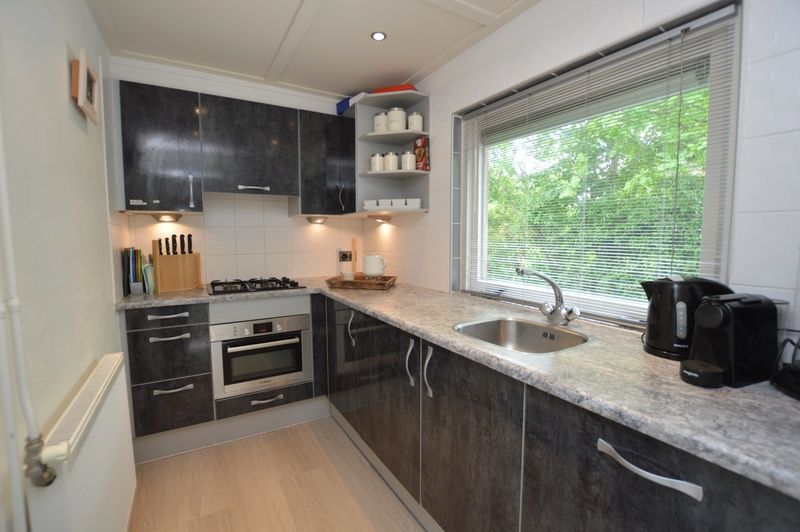 Gemuetliches Kinderzimmer im Bungalow 't Hoogelandt 24, De Dennen, Texel mit Etagenbetten und viel Tageslicht.