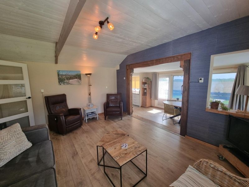 Indoor area of Weidezicht in De Dennen, Texel with open connection to dining room.