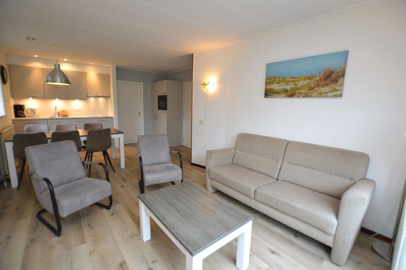 Open kitchen and living room in Holiday home de Parel 196, De Dennen, Texel.