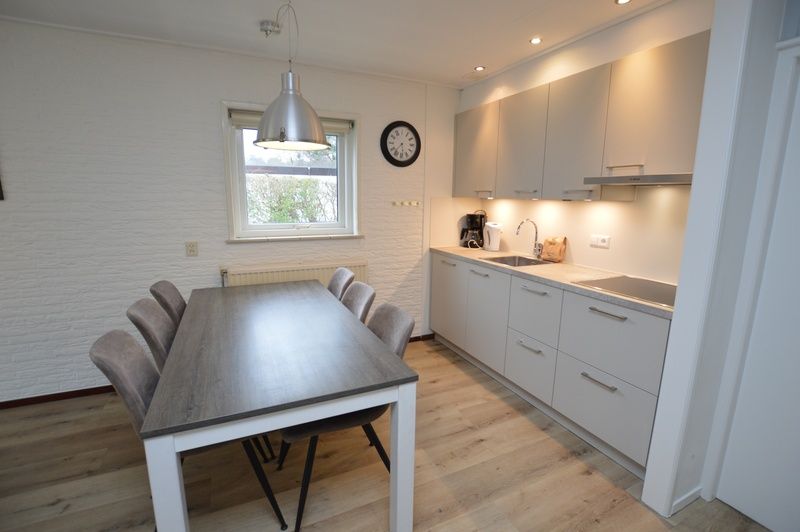 Stylish kitchen of Holiday home the Pearl 196, De Dennen, Texel with modern appliances.