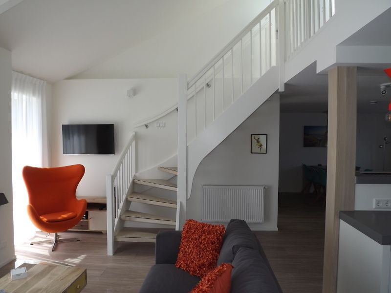 Stylish staircase and sitting area in Holiday home Gortersmient 350, De Dennen, Texel.
