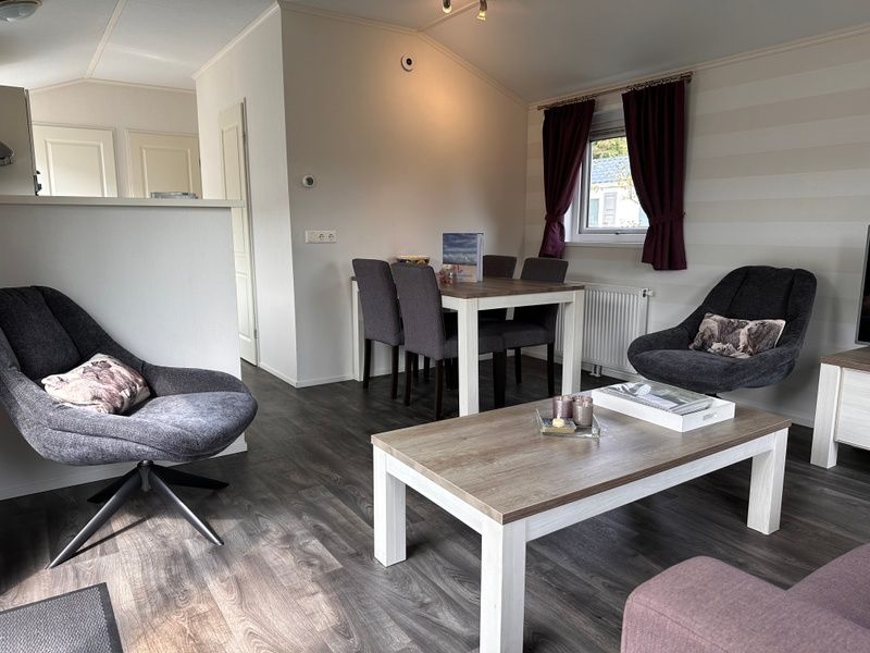 Comfortable sitting and dining area in Holiday Park de Bremakker, De Dennen, Texel.
